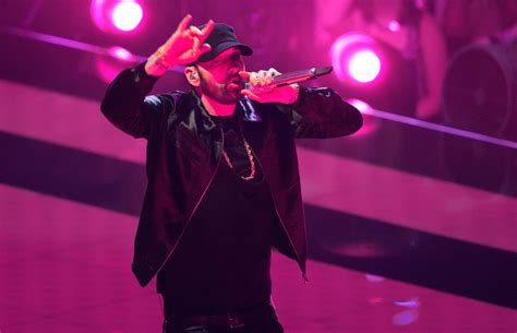 does eminem give to charity|Eminem makes donation to Spartan Strong fund.